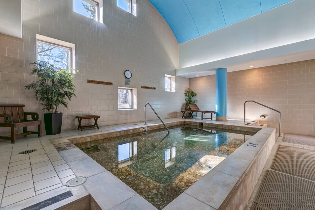 The indoor soaking pool and thermal area at The Spa at The Peaks
