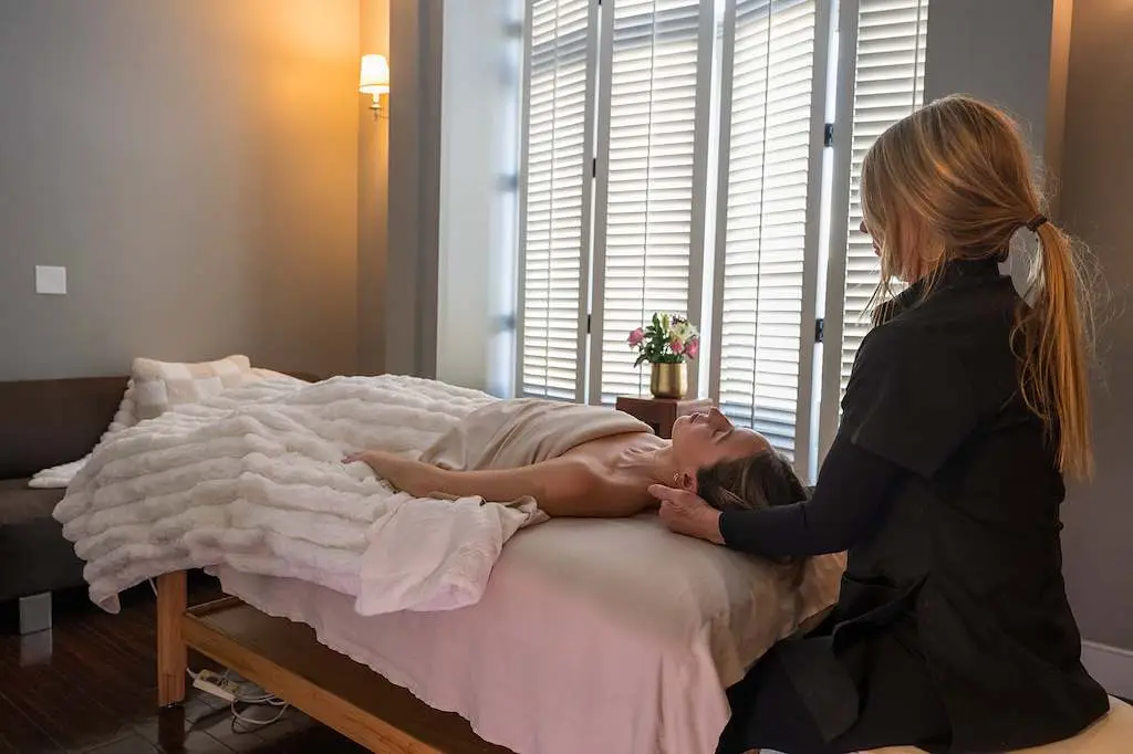 A massage treatment in progress at The Spa at The Peaks