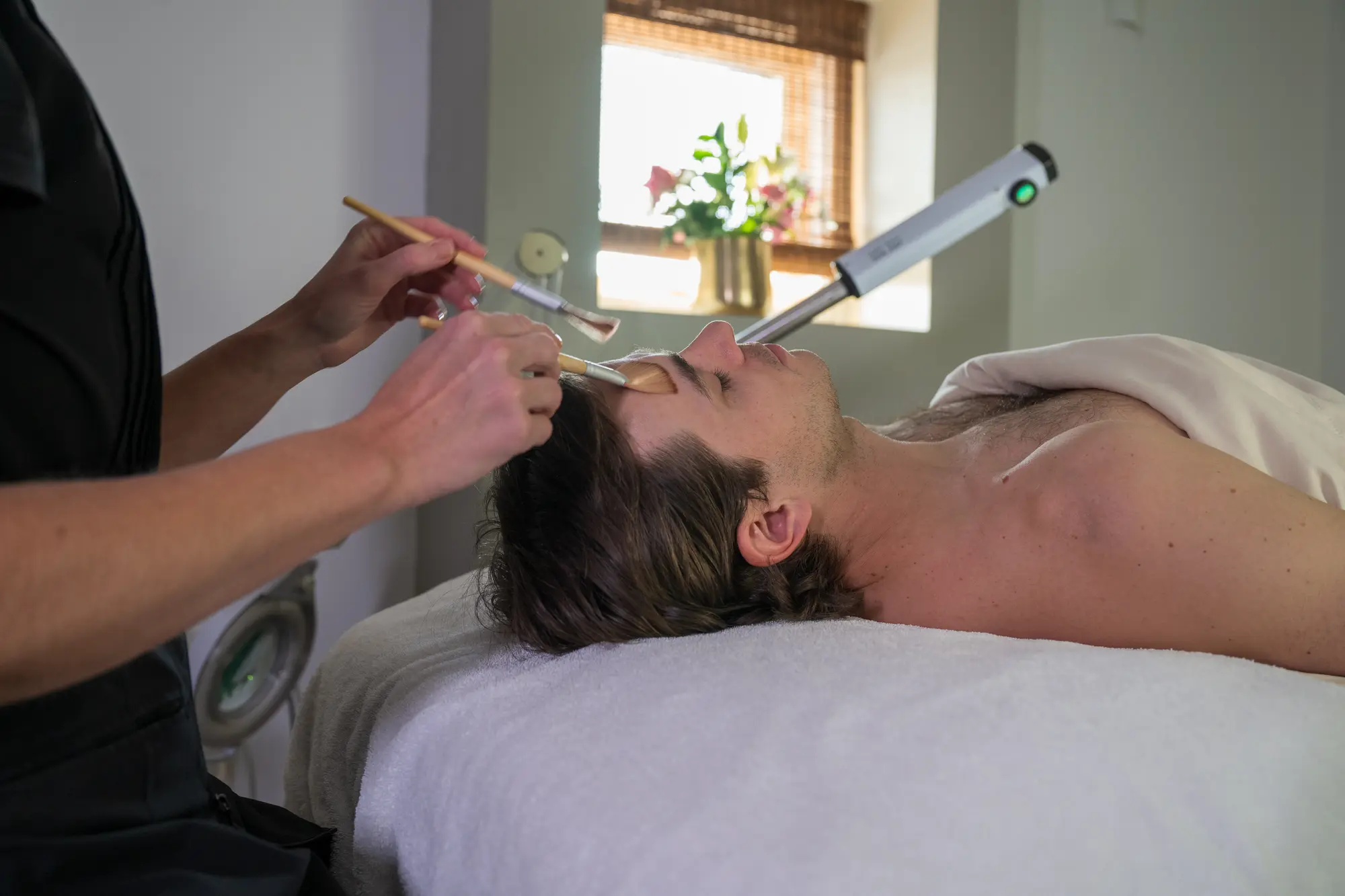 Guest receiving a facial treatment